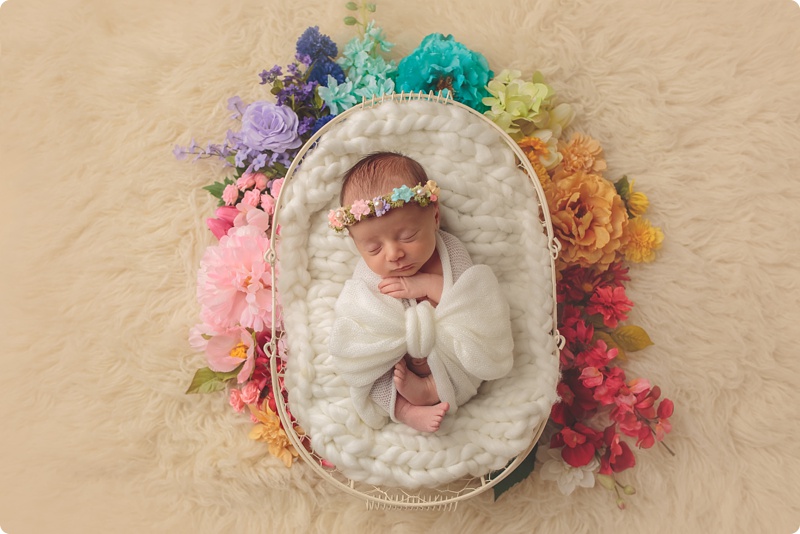 rainbow baby, rainbow newborn, baby girl, newborn photographer, rainbow flowers, neutrals, parent posing