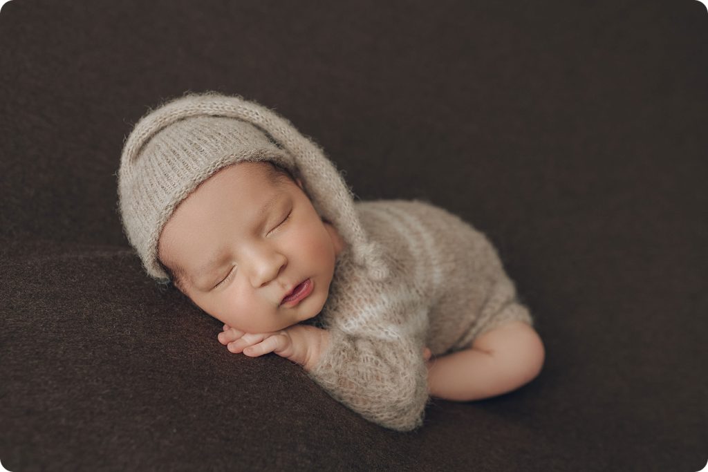 Beka Price Photography captures newborn baby in cap