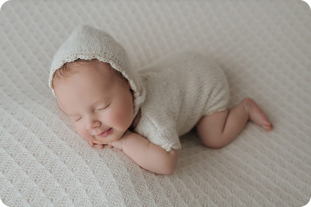 baby girl sleeps during newborn portraits in Salt Lake City UT