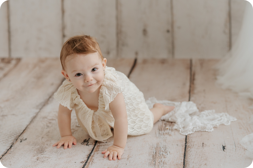 baby crawls during milestone photos in Utah studio with Beka Price Photography