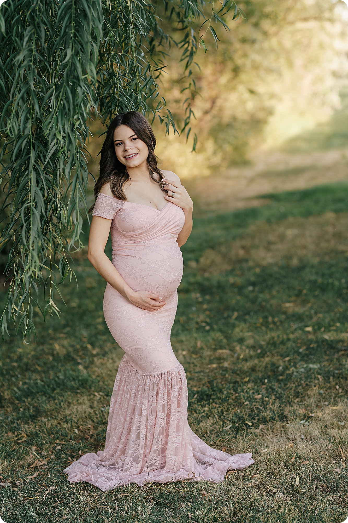 mom holds baby belly during Utah maternity session with Beka Price Photography