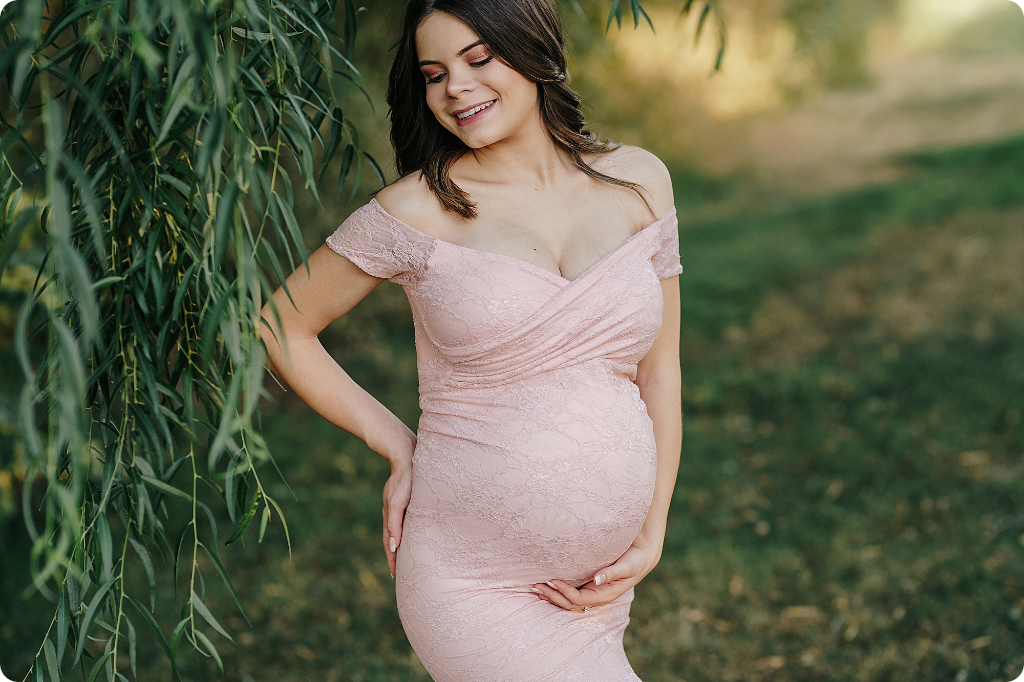 mom in pink maternity gown during Utah Fall Maternity Portraits