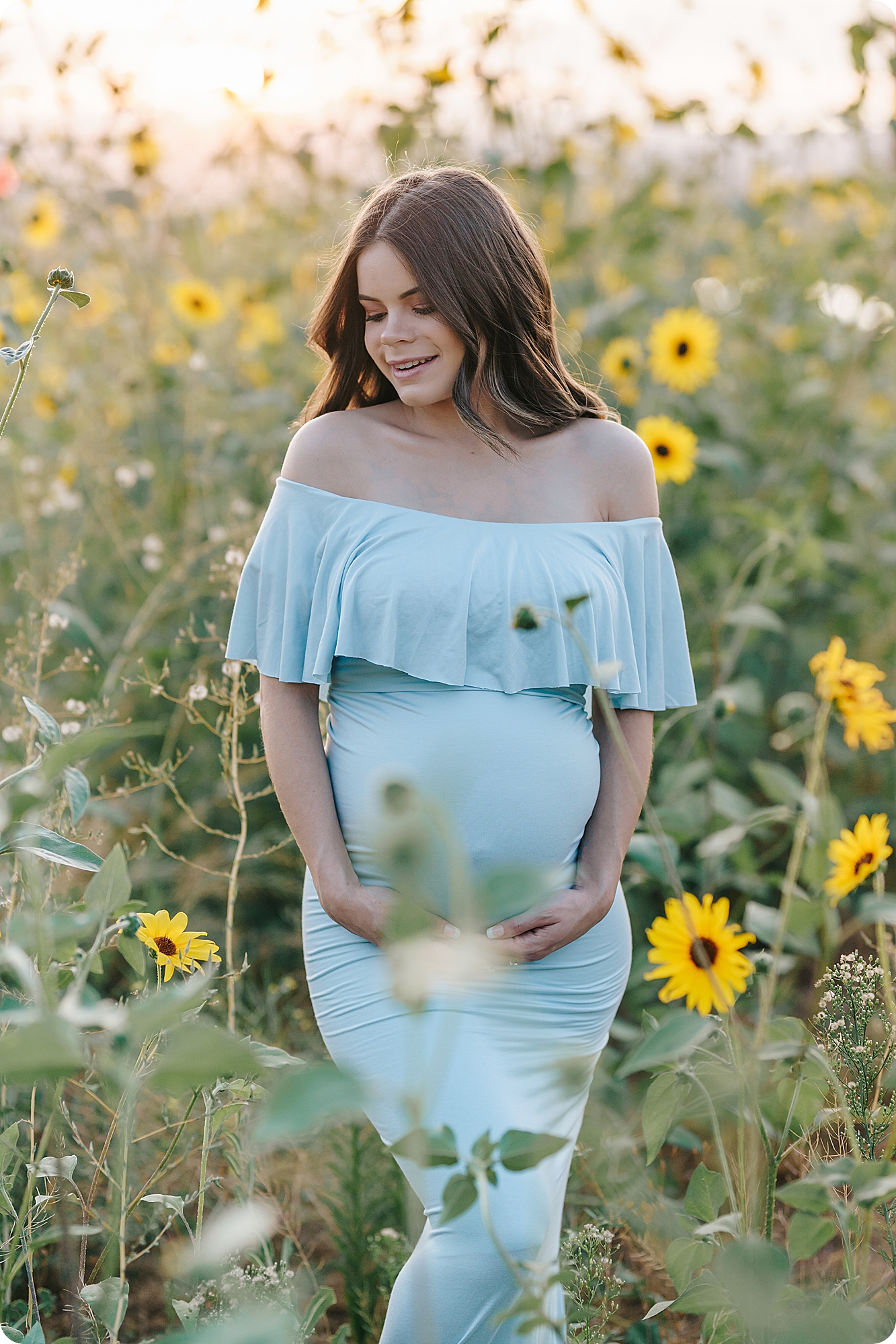 Utah maternity session in field of flowers
