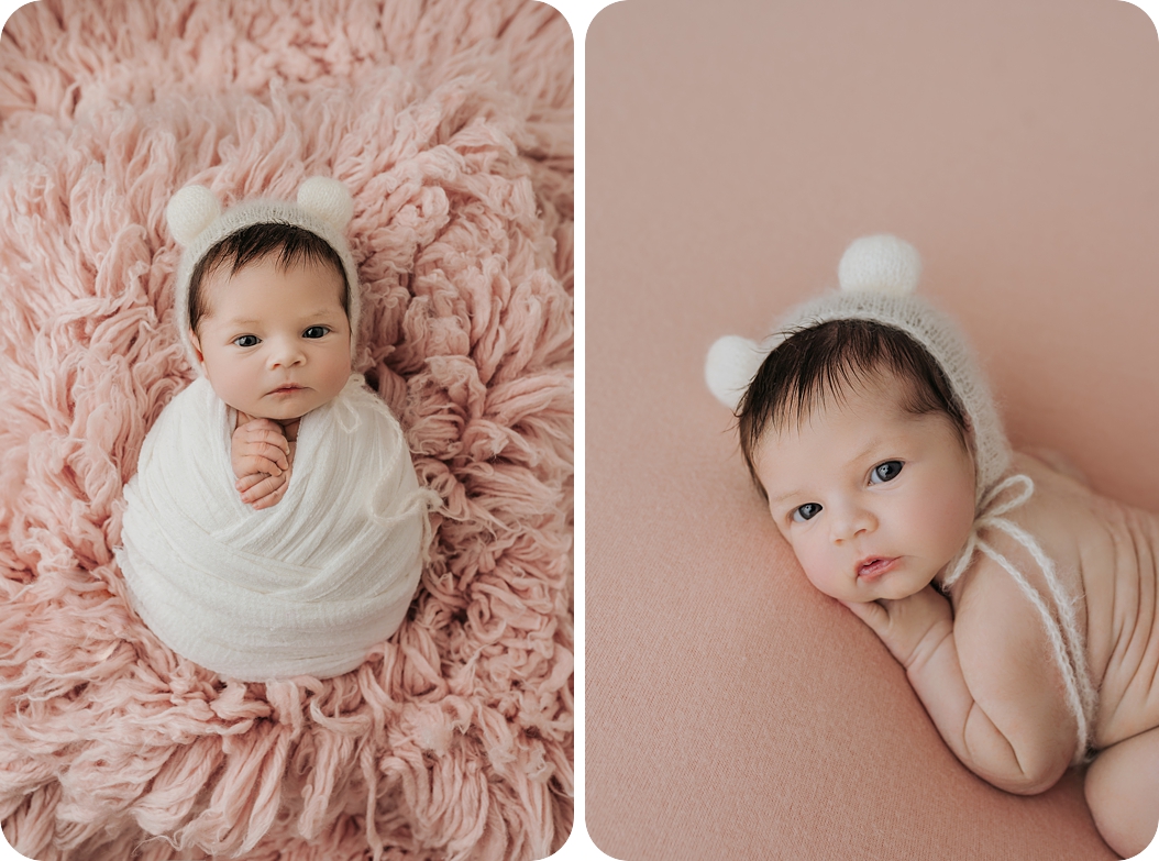 baby girl in bear hat looks at newborn photographer Beka Price Photography 