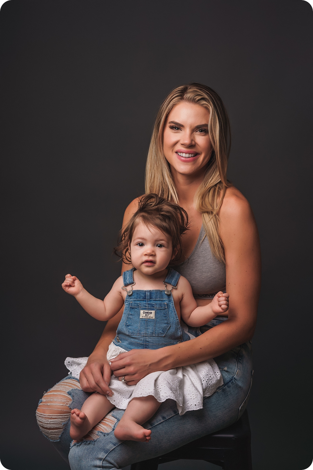 mom poses with daughter during glamorous studio portraits in Utah