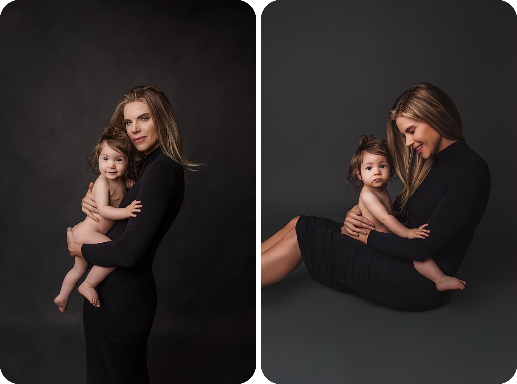 mom snuggles with toddler while wearing black dress during glamorous studio motherhood session