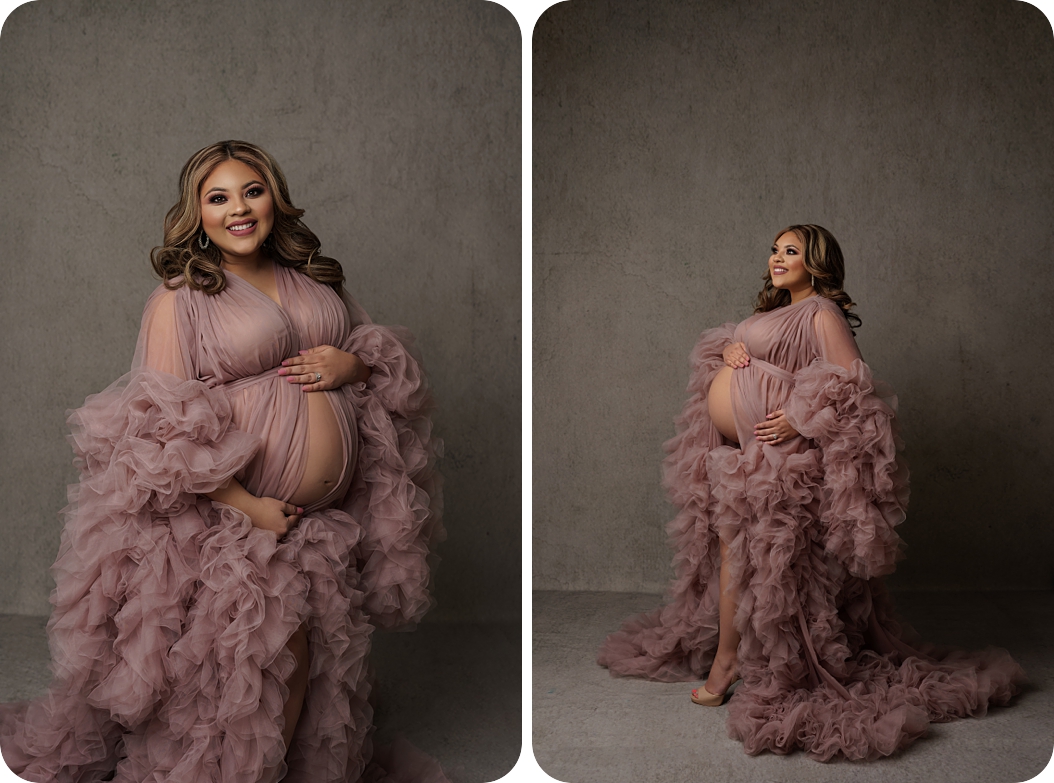 mom in blush couture maternity gown poses in studio during maternity photos 