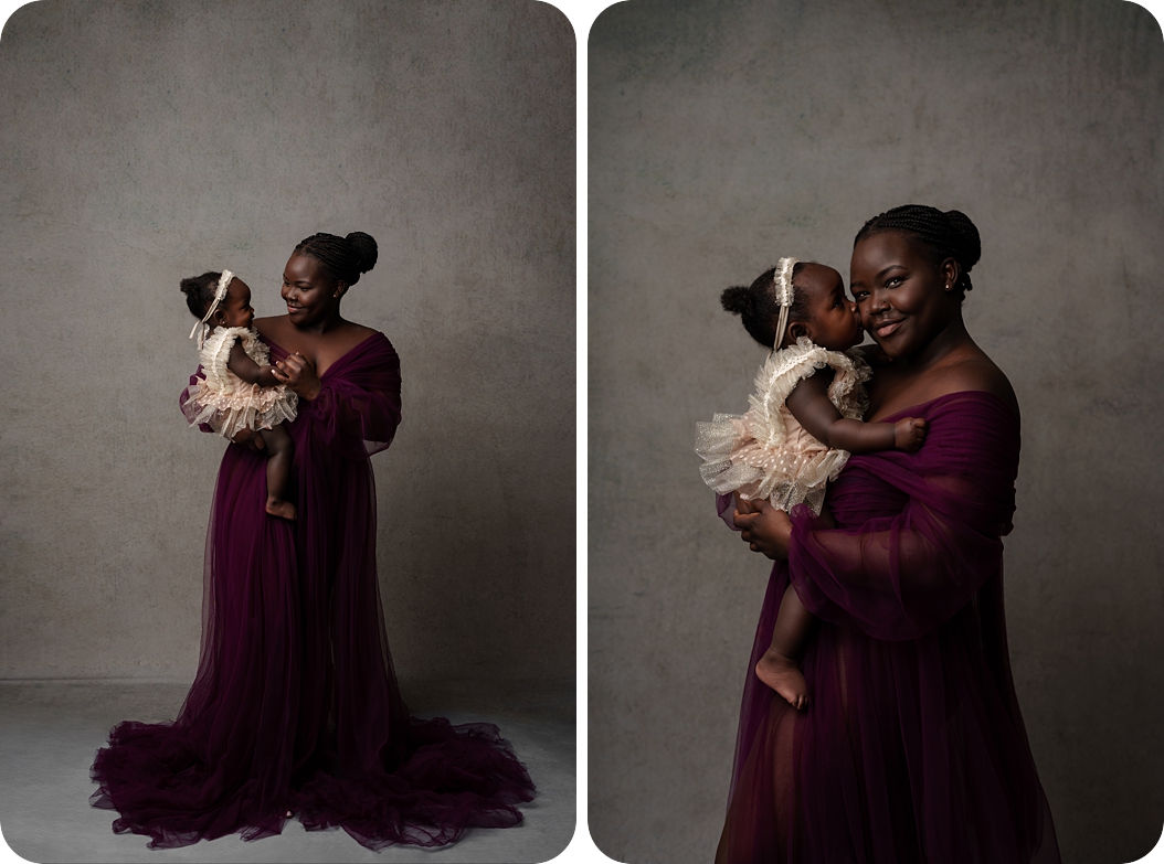 baby hugs mom in mulberry gown during studio milestone portraits 