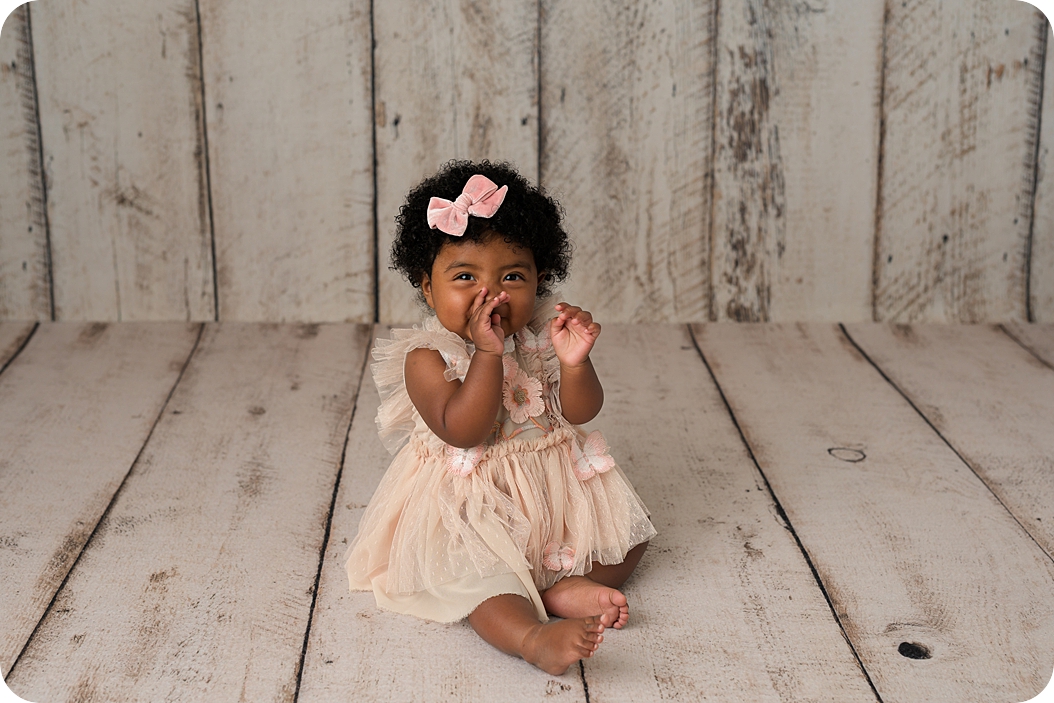 baby laughs during milestone photos in Utah studio
