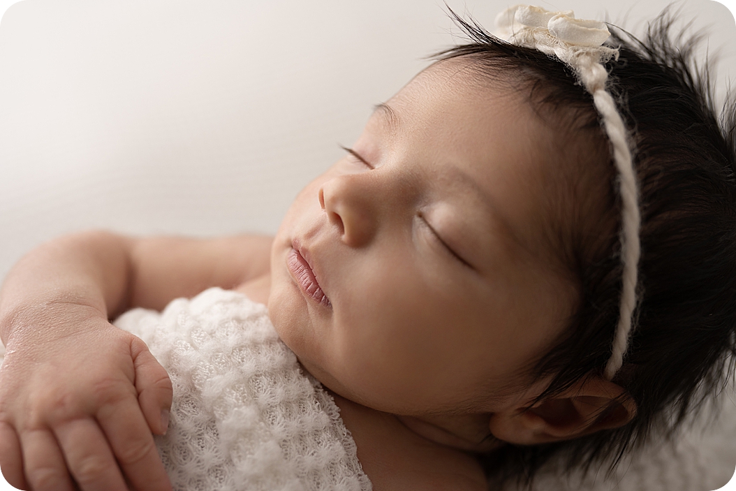 closeup of newborn baby girl during fall inspired newborn portraits 