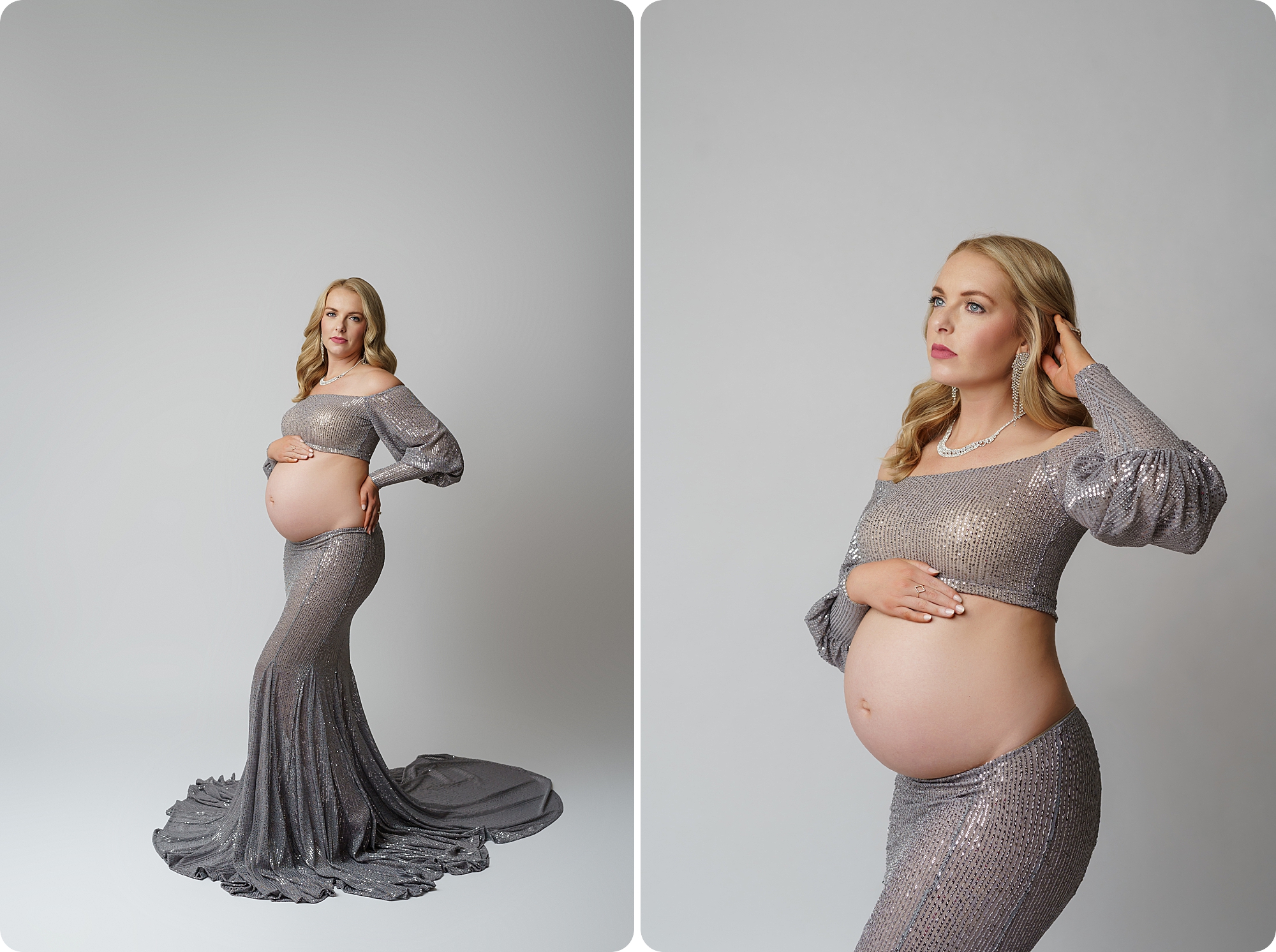 mom in two piece glittery silver gown holds belly during dramatic studio maternity portraits