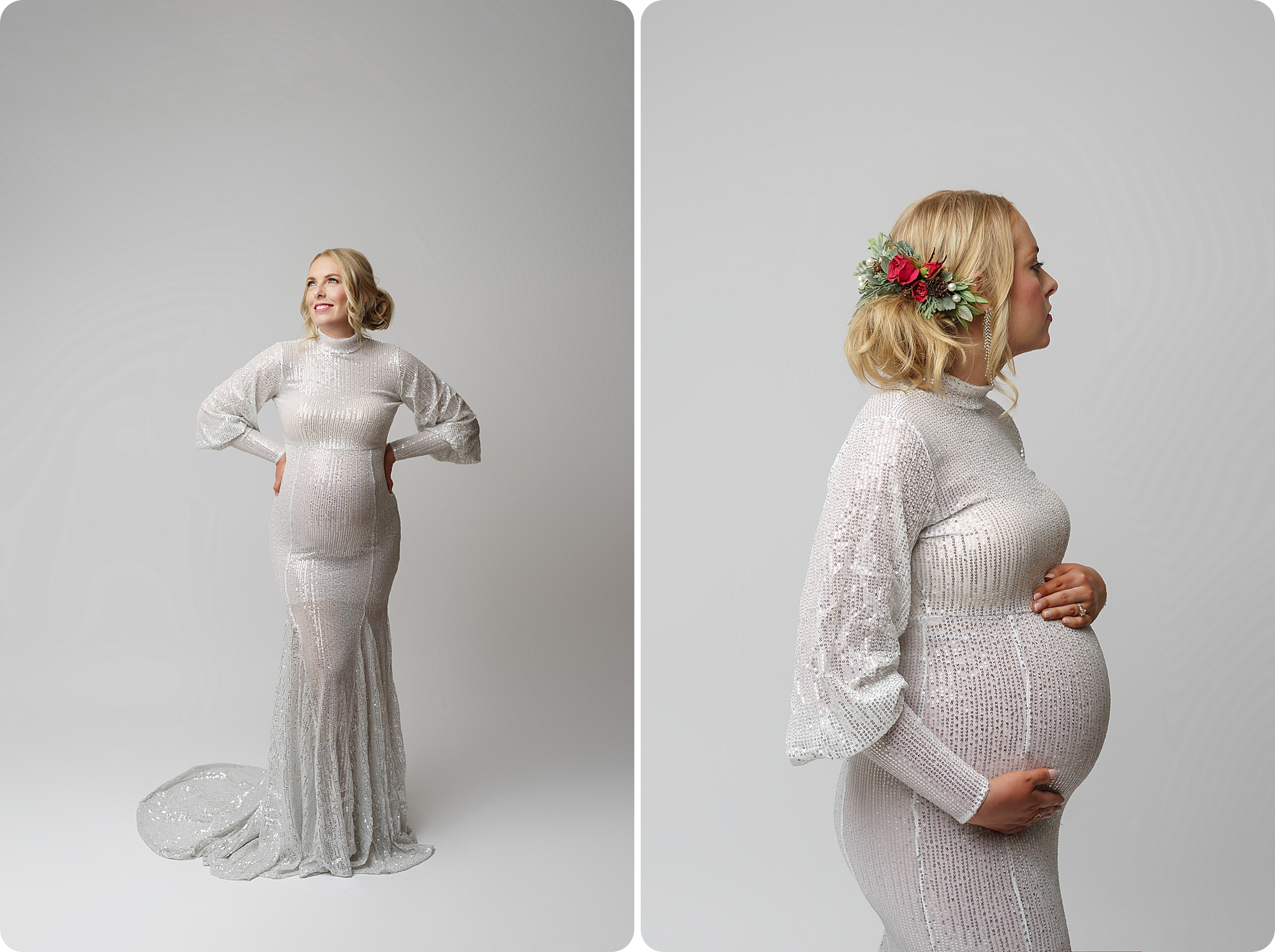 mom in white gown with holiday hairpiece holds belly during maternity session 